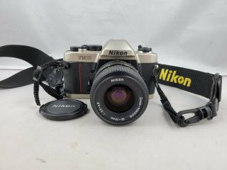 Vintage Nikon FM10 35mm SLR Film Camera w/ 35 - 70mm 1:3.  5/4.  8 Zoom - Nikkor Lens 2