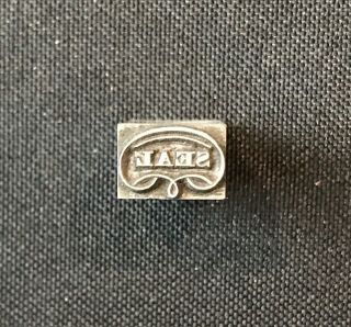 Vintage Letterpress Printing Block Seal Symbol 1” X.  5”