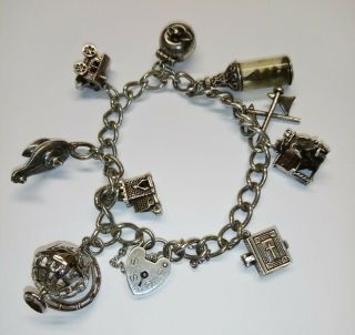 Vintage Sterling Silver Charm Bracelet With 9 Silver Charms