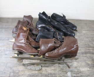 Five Pairs Of Vintage Leather Ice Skates.