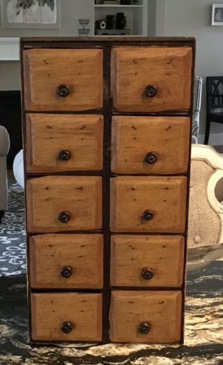 Antique Apothecary Cabinet With 10 Drawers Labeled