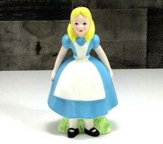 Alice In Wonderland Figurine Disney Every Adventure Requires A First Step