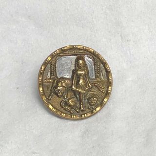 Antique Brass Metal Button - Lion Tamer With Twinkle Background