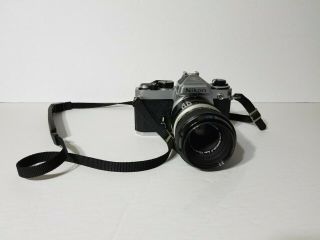 Vintage Nikon Fe Camera With 55mm Lens