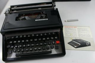 Vintage Underwood 320 Black Typewriter With Instructions & Portable Case