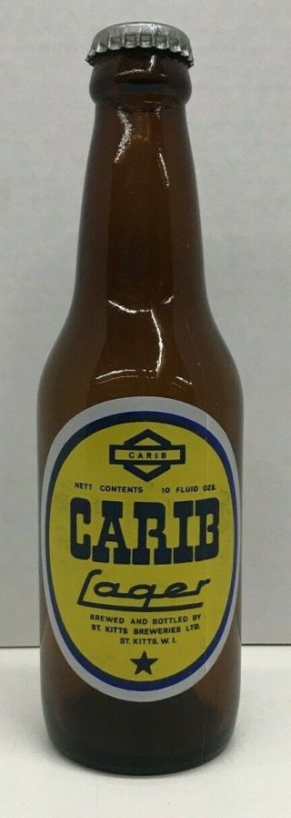 Vintage Carib Lager Beer Bottle W/cap.  10 Oz.  Brown Bottle,  Painted Label (1979)