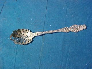 Early 20thc Whiting Sterling Silver Lily Pattern Pierced Olive Serving Spoon