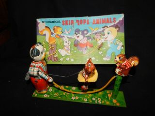 Vintage T.  P.  S.  Mechanical Skip Rope Animals Wind Up Toy