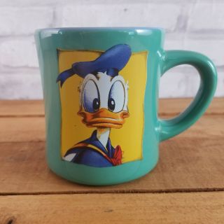 Disney Store Donald Duck Coffee Cup Mug 12 Oz Light Green With Yellow Accents