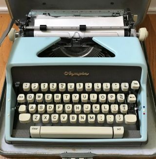 Vintage Olympia Baby Blue De Luxe Portable Typewriter West Germany Hard Case