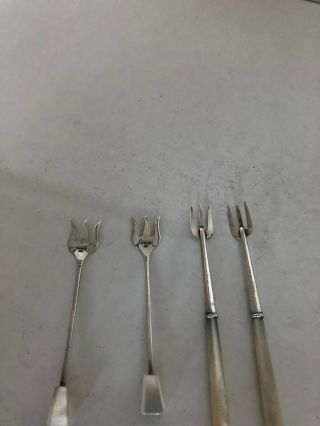 TWO PAIRS OF SOLID SILVER AND MOTHER OF PEARL PICKLE FORKS 3