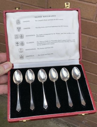A Good Cased Set Of Six Solid Silver British Assay Office Display Spoons,  1960.