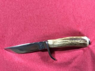 Very Rare Ray Johnson Knife W/ Leather Sheath.  8 1/2” Long.  Blade Is 4 1/2” Long