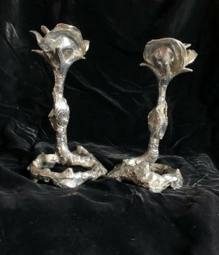 A Sterling Silver Candle Sticks In The Form Of A Rose