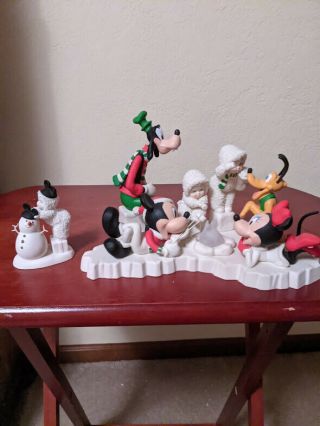 Two Department 56 Snowbaby Figurines With Disney 