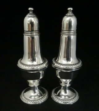 Vintage/antique Empire Sterling Silver Salt & Pepper Shakers.  5 ¼” Tall.