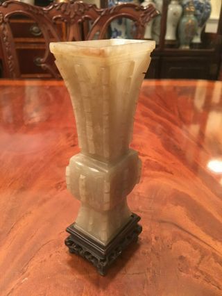 A Rare Chinese Early Qing Dynasty Carved Jade Gu Vase with Wooden Stand. 2
