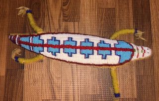 8.  16” Native American Plains Sioux Beaded Lizard Umbilical Fetish - 19th Century