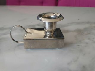 A Vintage Silver Plated Candle Holder And Match Box Holder.  Very Ornate.