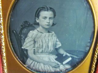 Young Girl Holding A Book Daguerreotype Photograph