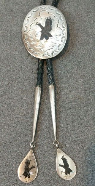 Larry Watchman Eagle Inlay Stamped Sterling Silver Bolo Tie Native American