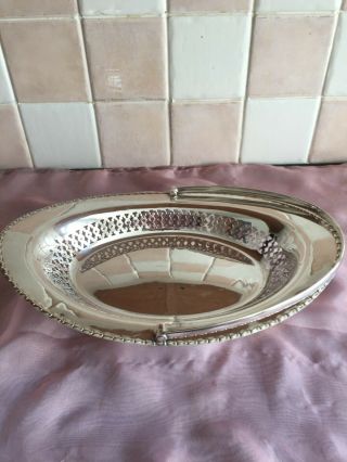 Silver Plated Swing Handled Dish Standing On 4 Ball Feet