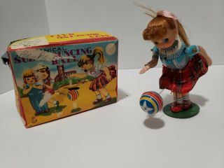 Vintage Suzy Bouncing Ball Tin Wind Up