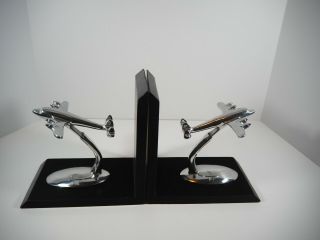 Vintage Aluminum Airplane Dc 7 On A Black Wood Book Ends
