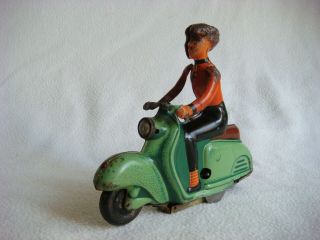 Wind - Up Mechanical Toy - A Lady On A Scooter.  Ms Brandenburg.  Rare