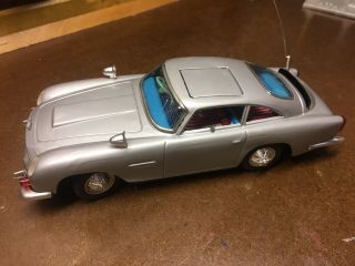 James Bond Aston - Martin Battery Operated Toy Car By Gilbert Toys 1966