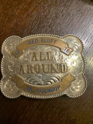 Champion Trophy Rodeo Buckle - All Around Cowboy - Champion - 1976 - Sterling
