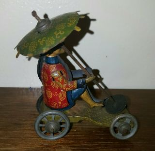 Vintage Distler Chinaman w/ Parasol German Tin Penny Toy 3