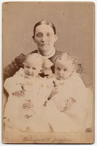 Fun Cabinet Card Of Woman Holding Two Babies With Bottles