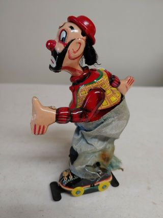 TPS CLOWN ON ROLLER SKATES - TIN LITHO WIND UP TOY - MADE IN JAPAN 1950s 2