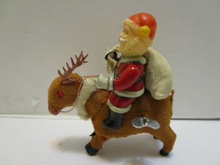 Vintage Japan Tin & Celluloid Santa Riding Reindeer Wind Up