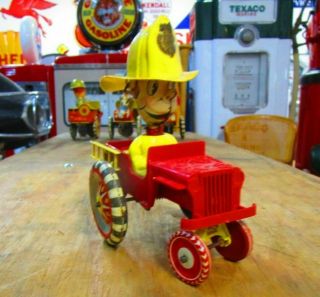 Vintage Marx Fireman & Fire Truck Wind Up Tin Toy