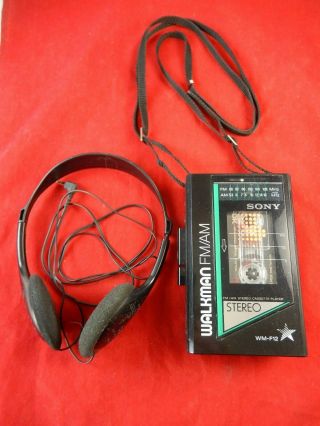 Sony Walkman Wm - F12 Vtg Am/fm Cassete Player With Walkman Stereo Head Phones.  E