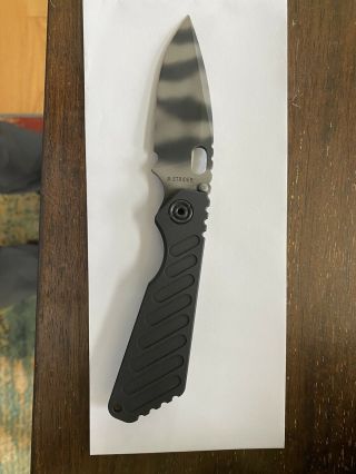 strider sng knife,  20CV TS Blade,  Aluminum with flamed Titanium.  Never Carried 2