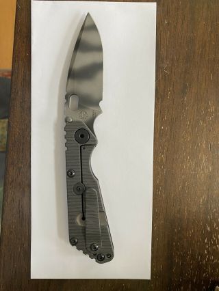 strider sng knife,  20CV TS Blade,  Aluminum with flamed Titanium.  Never Carried 3