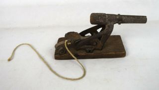 Antique Cast Iron On Wood Base Cap Gun Miniature Spring Loaded Cannon Toy
