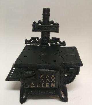 Vintage Queen Cast Iron Miniature Stove Salesman 