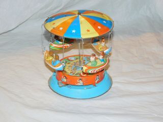 Vintage Made In Japan Tin Litho Toy Merry Go Round Metal Graphics Friction Old
