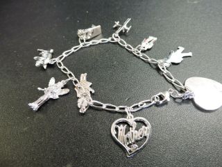 Vintage Sterling Silver Charm Bracelet With 9 Sterling Silver Charms