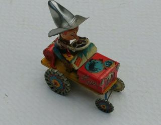 Vintage Unique Art Rodeo Joe Tin Wind Up Tractor Toy