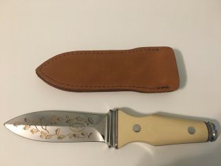 A.  G.  Russell Sting 1977 Gold Leaf Boot Knife