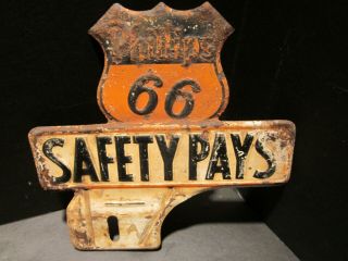 Old Vintage Phillips 66 " Safety Pays " Metal License Plate Topper