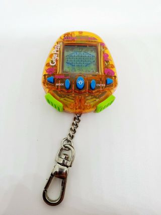 Giga Pet Plus Farm Orange Vintage 1997 Tiger Electronic Virtual Pet Keychain
