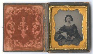 Cased Tintype Of A Woman Holding A Possible Figural Photo Case