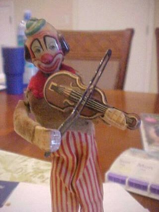 Vintage TPS Tin Wind - up Clown Playing Violin 8.  5 