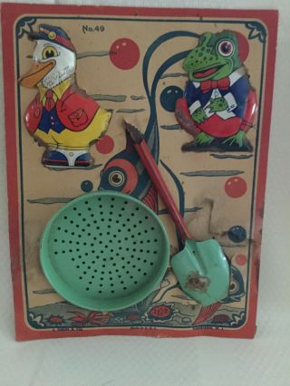 Vintage J.  Chien Tin Sand Toys 49,  Still Attached To Card